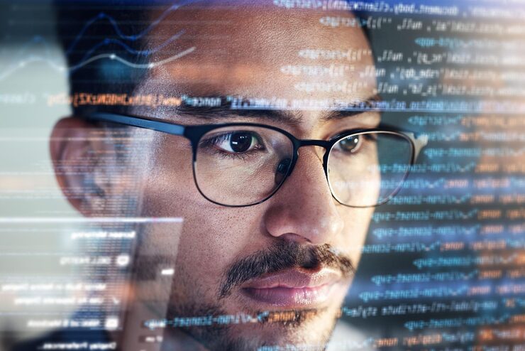 Photo man face and programmer coding at night with overlay or dashboard of code malware or software at office male person coder or developer working late in problem solving algorithm or programming