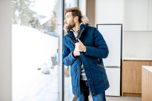 Man feeling cold at home