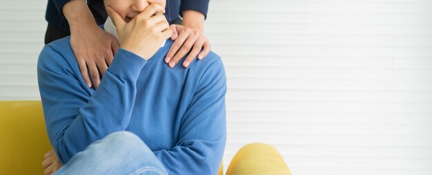 Photo man feeling happy and shy while boyfriends embrace for pride and lgbt lifestyle concept