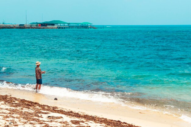 Man fishing at beach