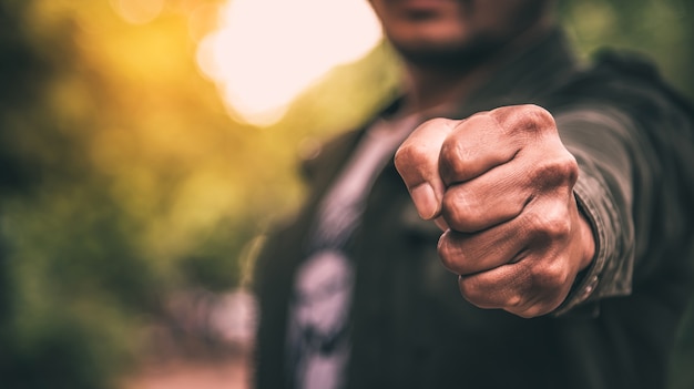 A man fists clenched in anger