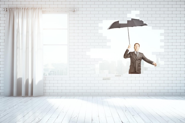 Man flying with umbrella