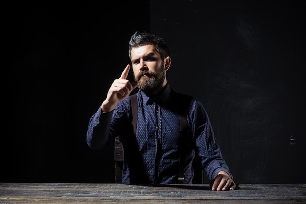 Man in formal outfit isolated on black background.