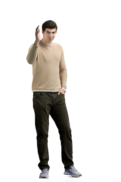 A man fulllength on a white background calls to him