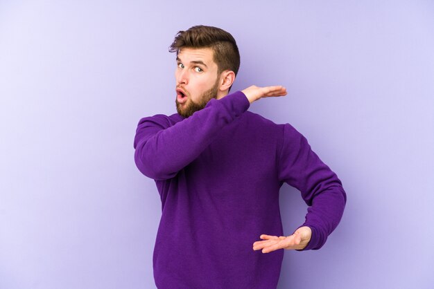 Man gesturing with hands in studio