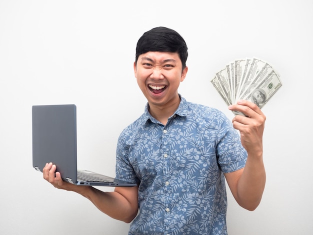 Man get a lot of money with online working feel satisfy and happy showing money