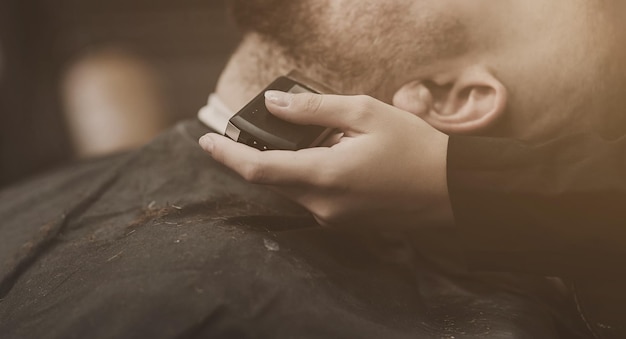 Man gets a shave in the salon