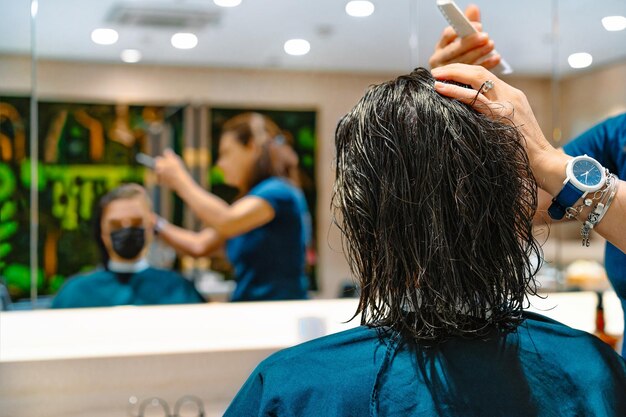 Man getting haircut at salon