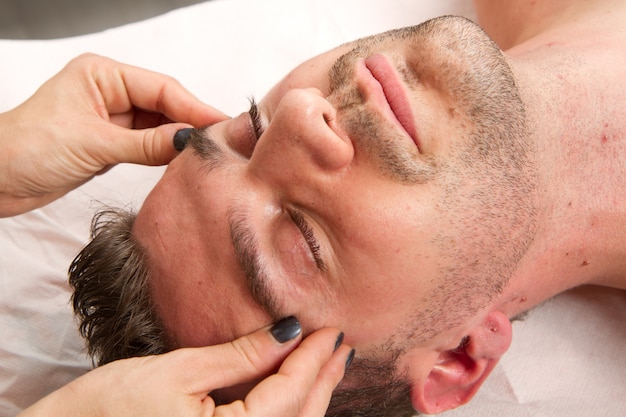 Man getting massage in thebeauty center