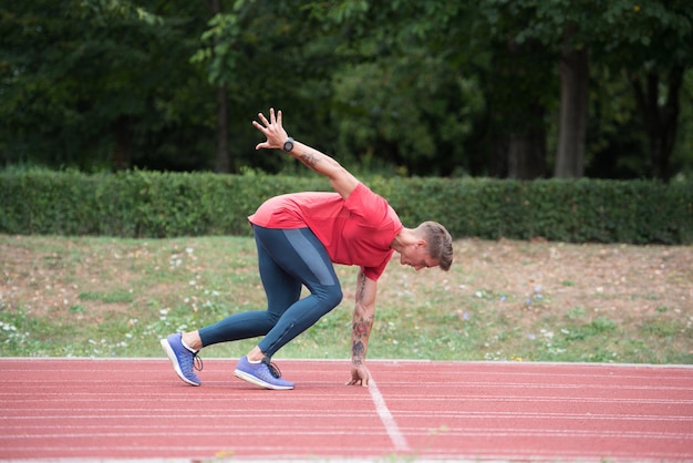 Man Getting Ready to Start Running