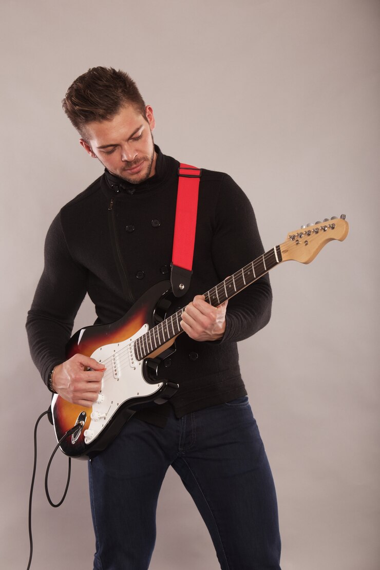 Man gitaar spelen