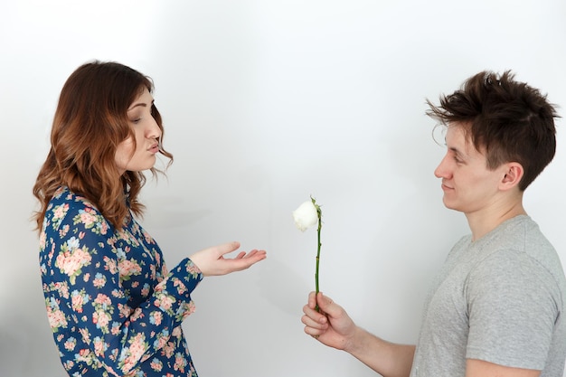 Man gives woman a broken flower