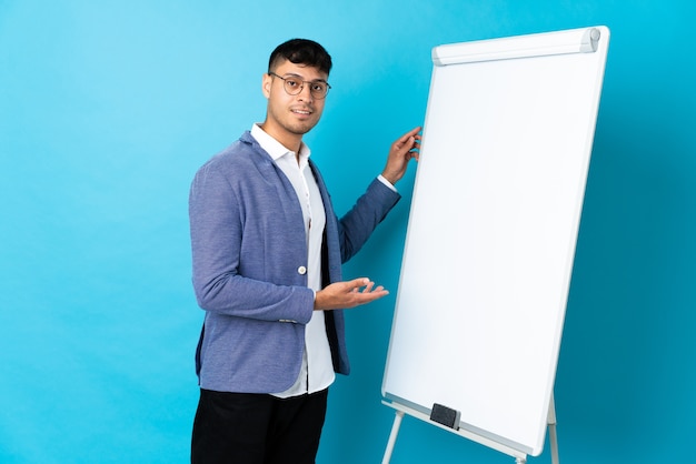 Man giving a presentation on whiteboard