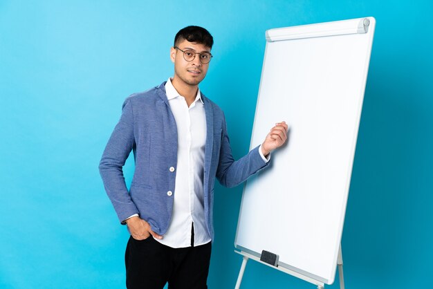 Man giving a presentation on whiteboard