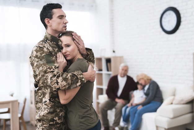 Man Goes To Military Service and Goodbye with Wife.