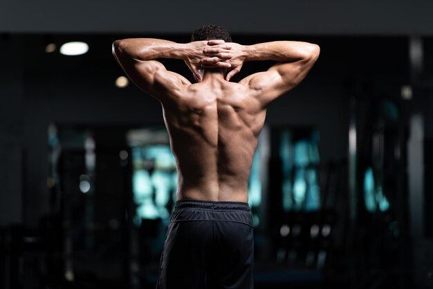 Man In Gym Showing His Well Trained Body