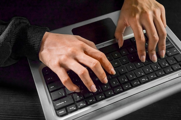 Man hand on keyboard close up