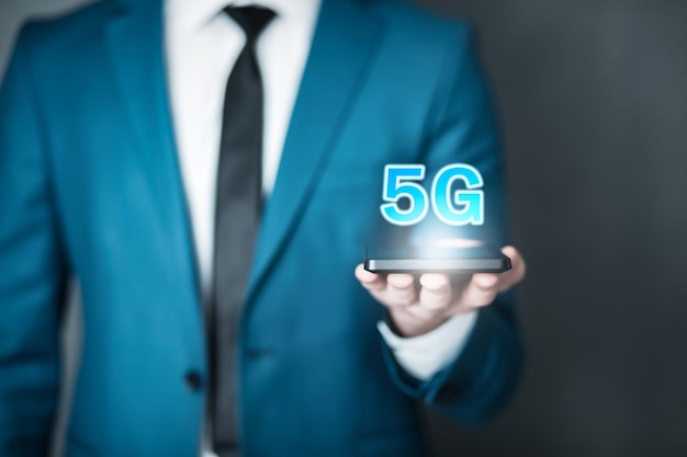 Man hand phone and 5G in screenxA