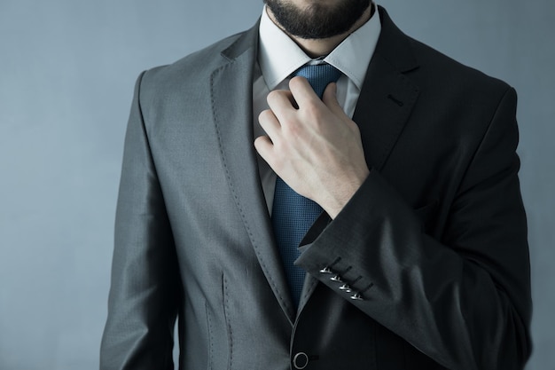 Man hand in tie