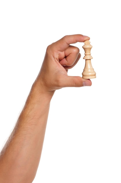 Photo man hand with figure chess isolated on white background