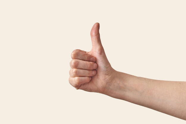 Man hand with thumb up