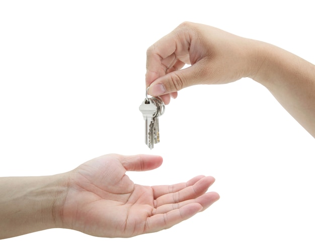 Man handing over the set of keys house