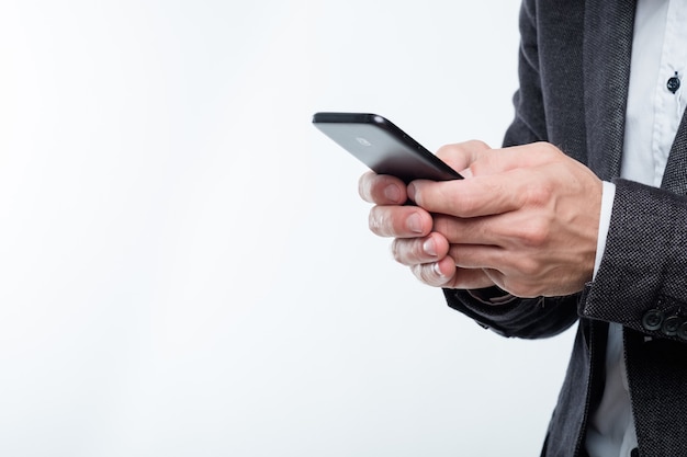 Man hands holding mobile phone. technology and communication.