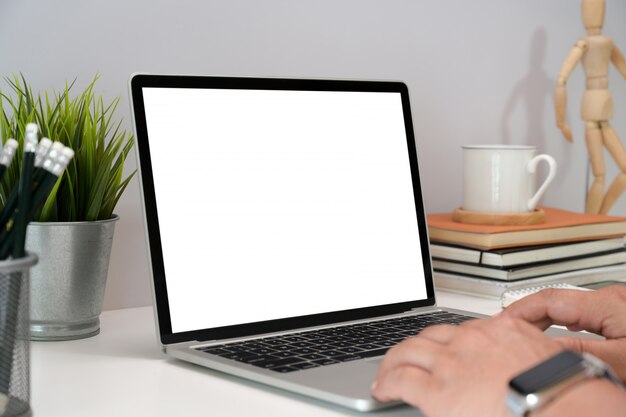 Man hands working with his laptop