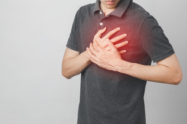 man has chest pain suffering by heart disease