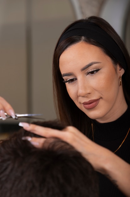 Photo man having hair cut at latino hair salon