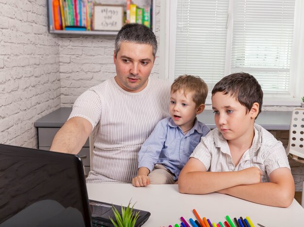 Man having video chat online on laptop isolation pandemic