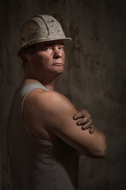 A man in a helmet miner