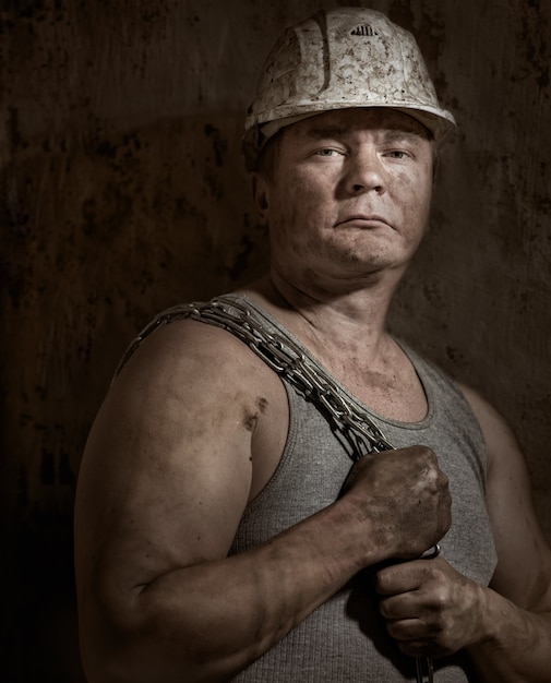 A man in a helmet miner