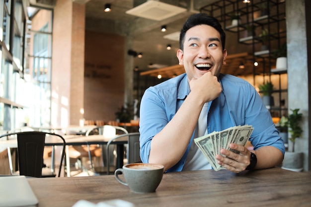 Man holding bank notes in hands