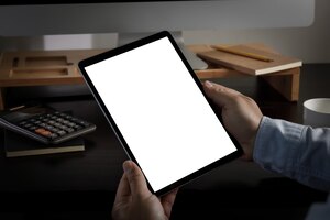 man holding blank screen tablet design  close up of ipad
mock up tablet computer