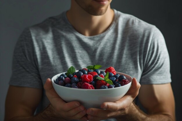 Man Holding Bowl of Fresh Berries