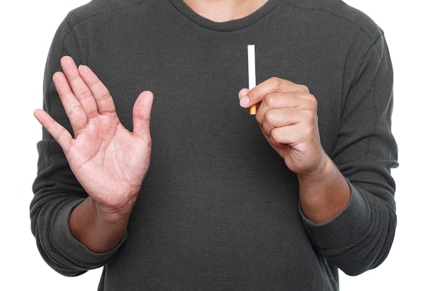 Man holding broken cigarette in hands Stop smoking cigarettes concept