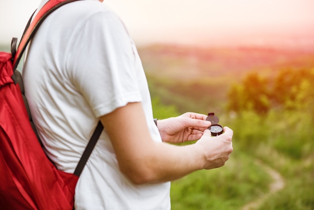 Man holding a compass