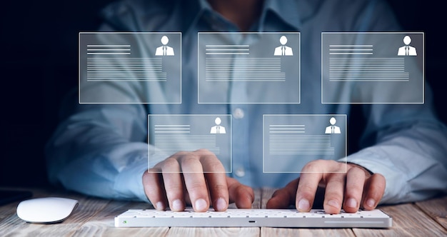 Man holding computer with recruiting icon