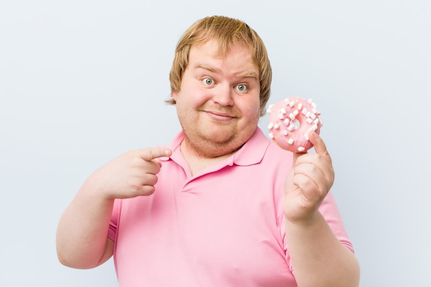 Man holding a donut