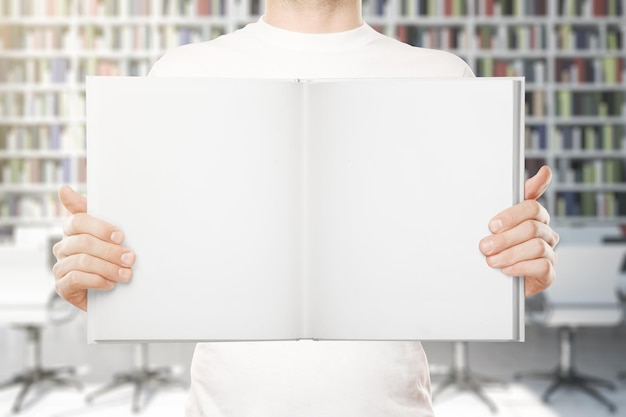 Man holding empty book