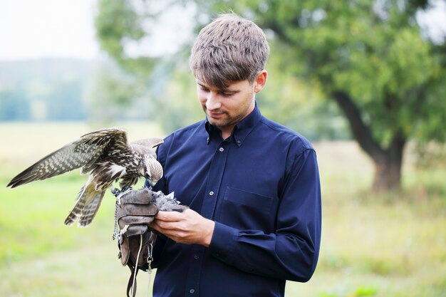 Man holding falcon