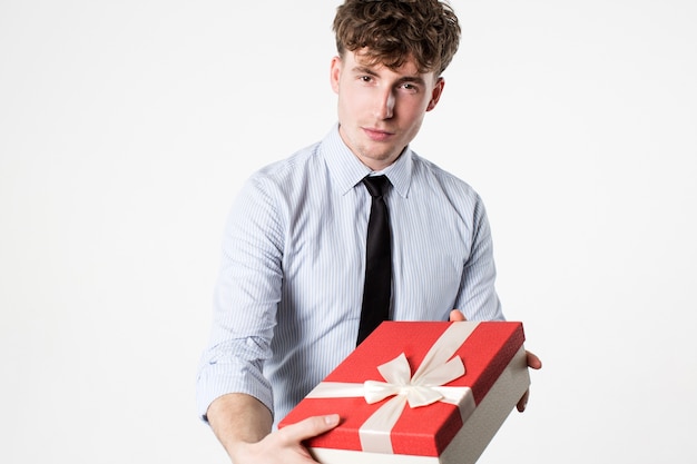 Man holding a gift box in his hands