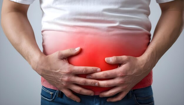 A man holding his stomach Pain in the stomach stomach intestines