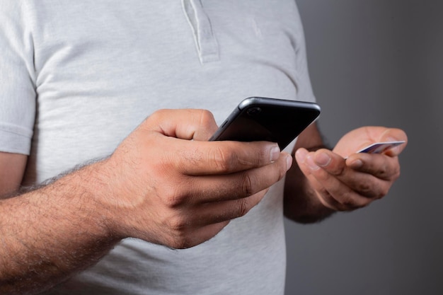 man holding a phone in studio