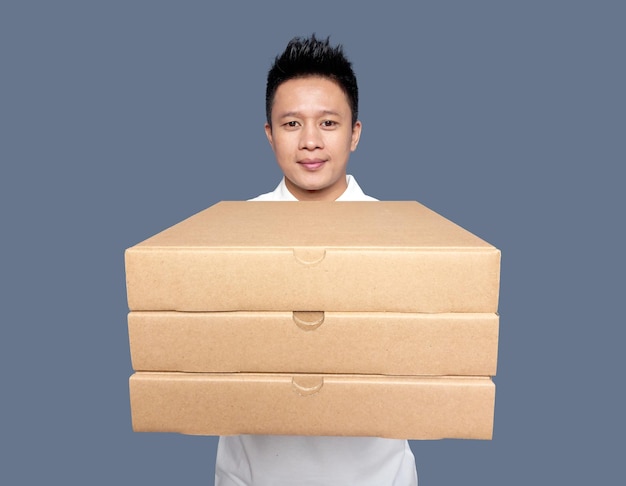 A man holding a pizza box with the word pizza on it