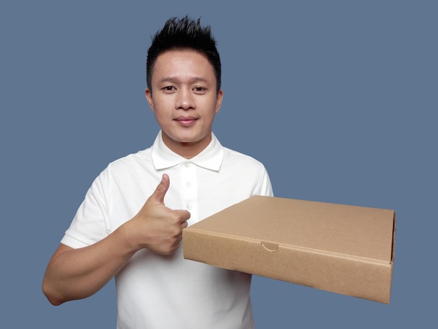 A man holding a pizza box with the word pizza on it