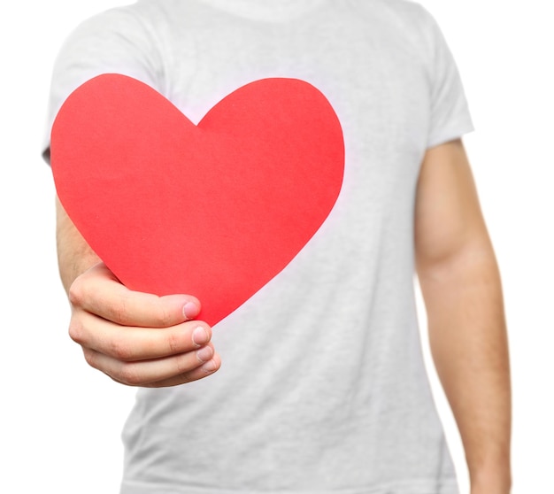 Man holding red paper heart in hand isolated on white