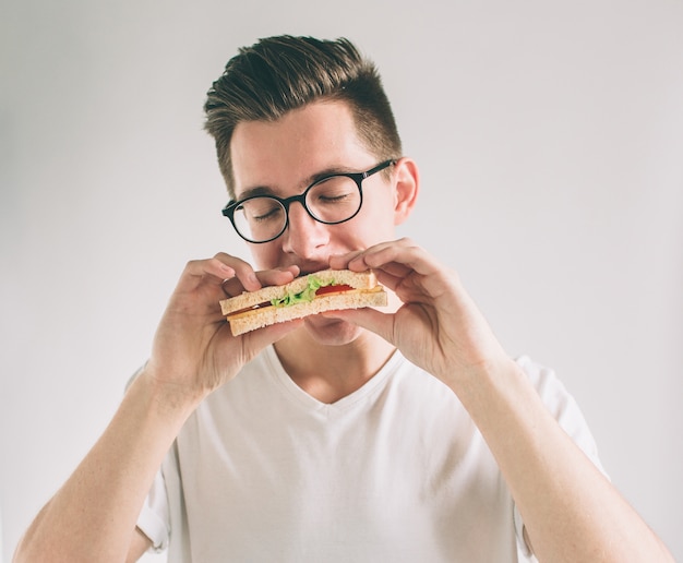 Man holding a sandwich