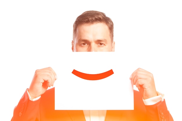 Man holding a sign on a face with title smile sign